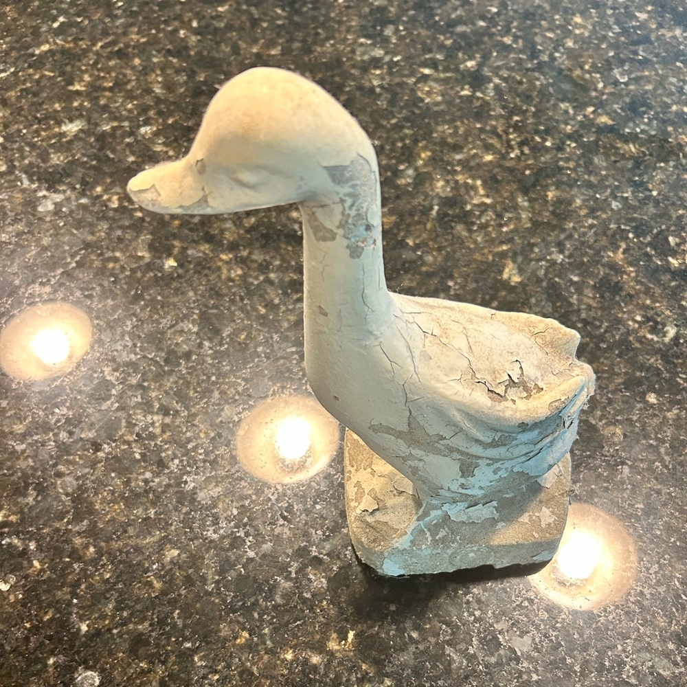 Antique shabby chic duck statue